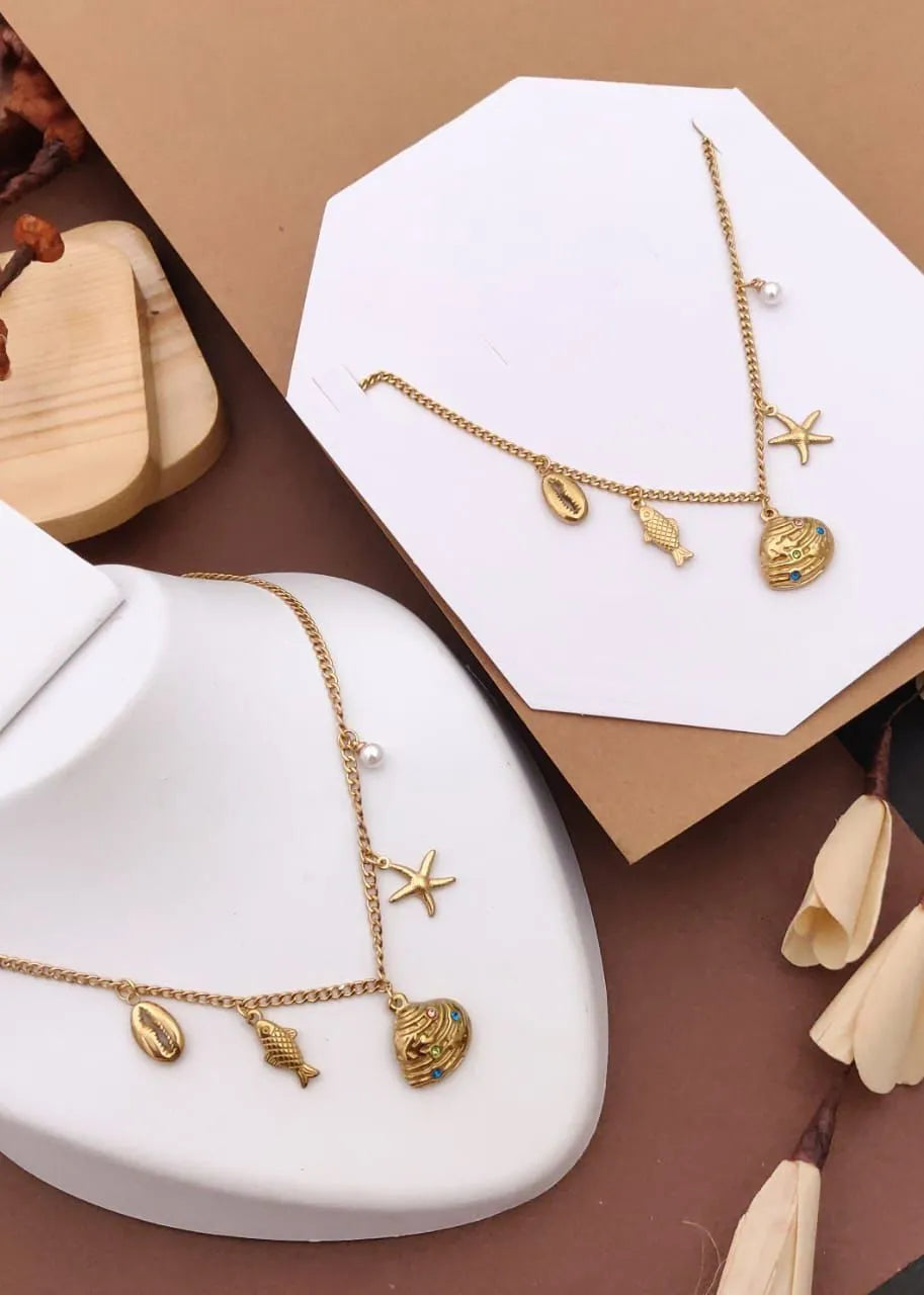 Ocean Inspired Gold Charm Necklace