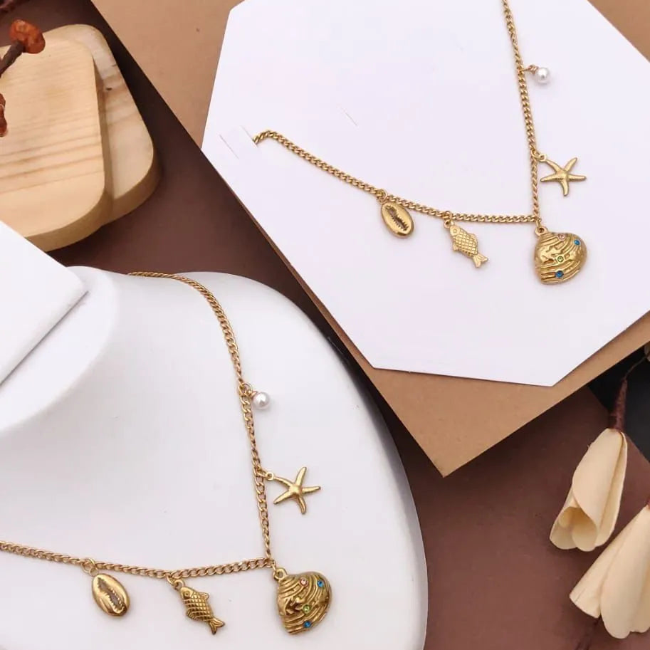Ocean Inspired Gold Charm Necklace