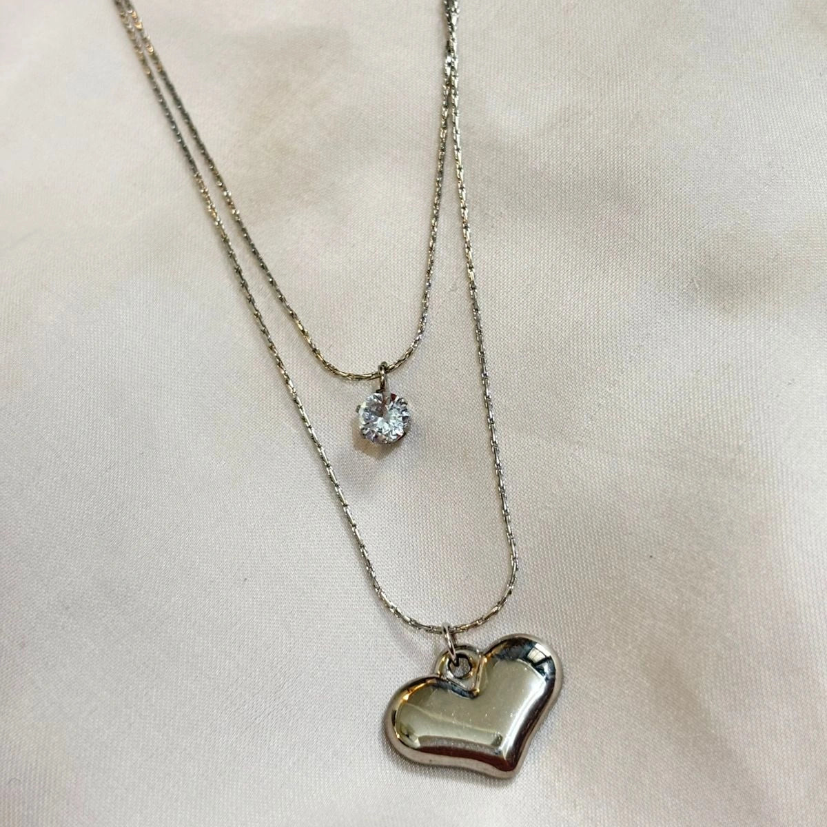 Elegant Silver-Plated Layered Heart & Crystal Pendant Necklace