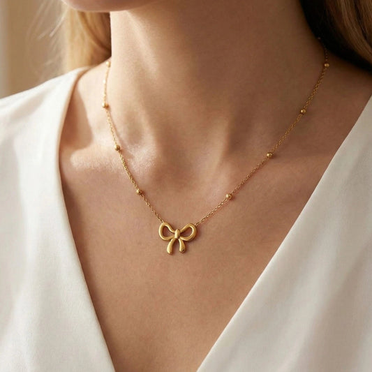 Gold Bow Charm Necklace
