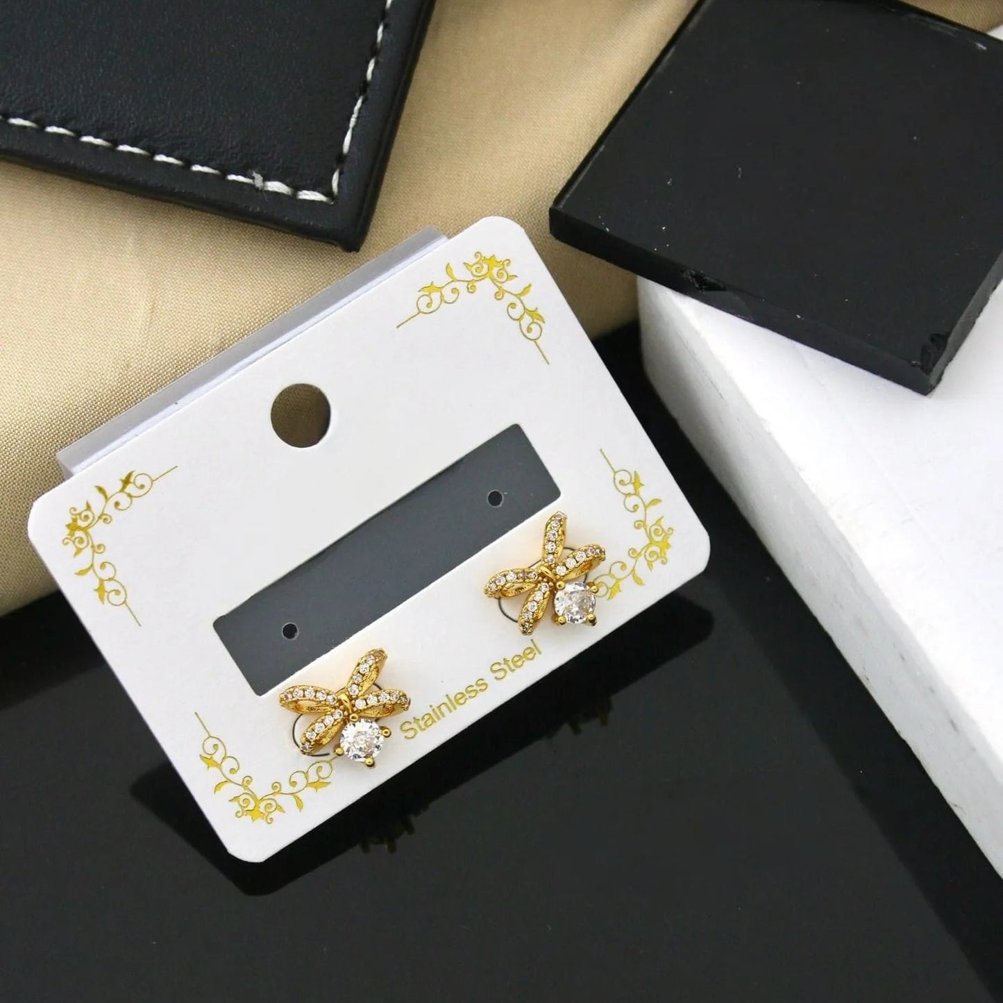 Golden Crystal Ribbon Stud Earrings