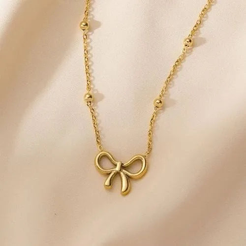 Gold Bow Charm Necklace