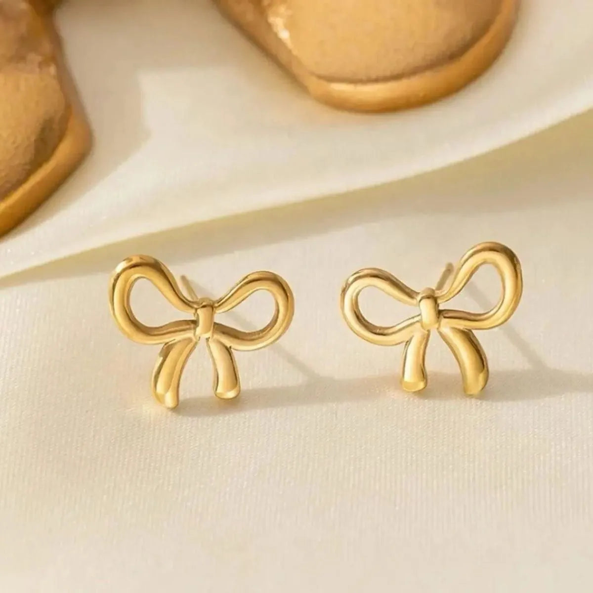 Open Bow Gold Earrings
