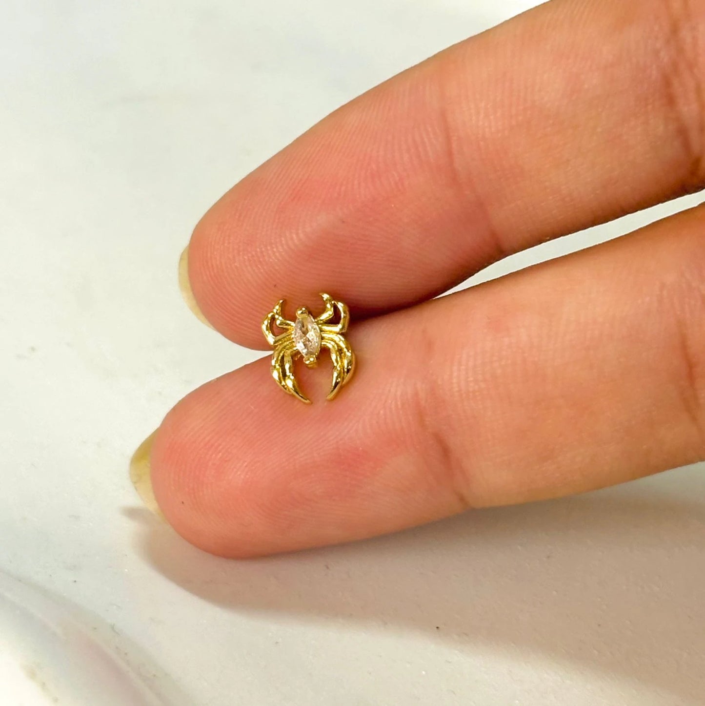 Golden Arachne Ear Piercing