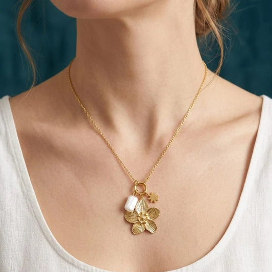 1. Golden Floral Charm Necklace