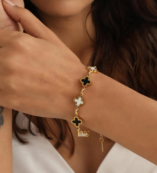 Elegant Gold-Plated Bracelet with Black and White Clovers