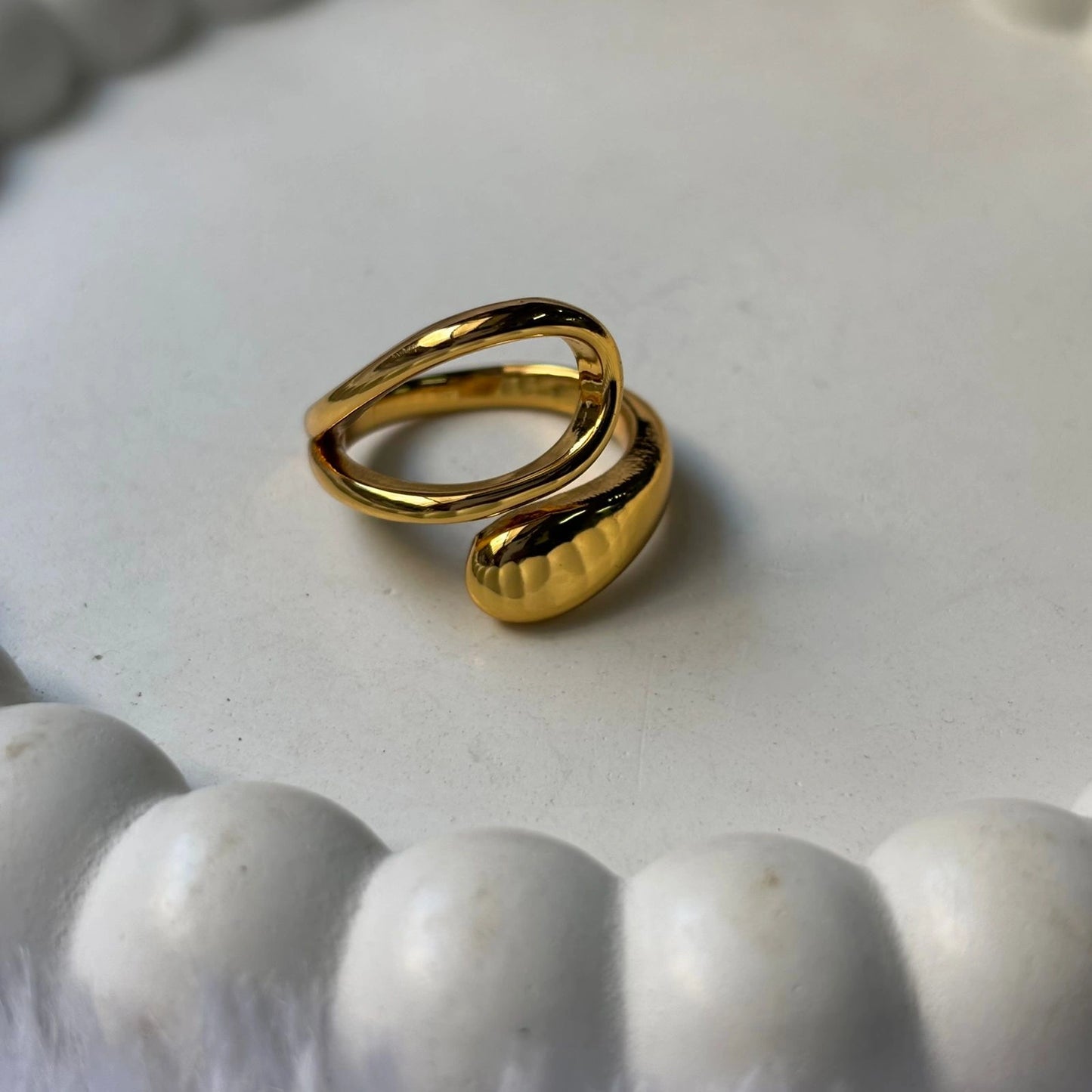 Modern gold curve ring