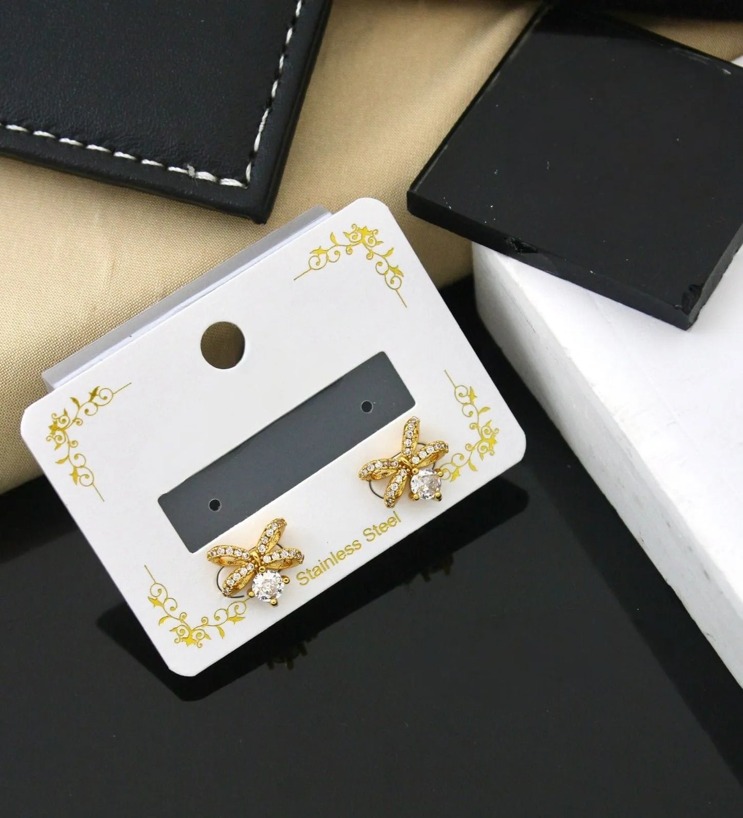 Golden Crystal Ribbon Stud Earrings