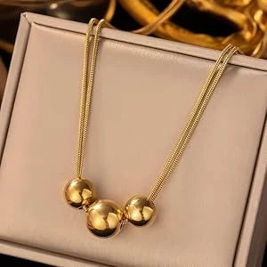 Orlena Golden Orb Statement Necklace