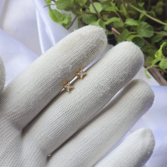 Princess Cut Gold Ear Piercing