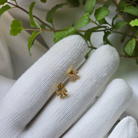Twinkle Bow Gold Ear Piercing