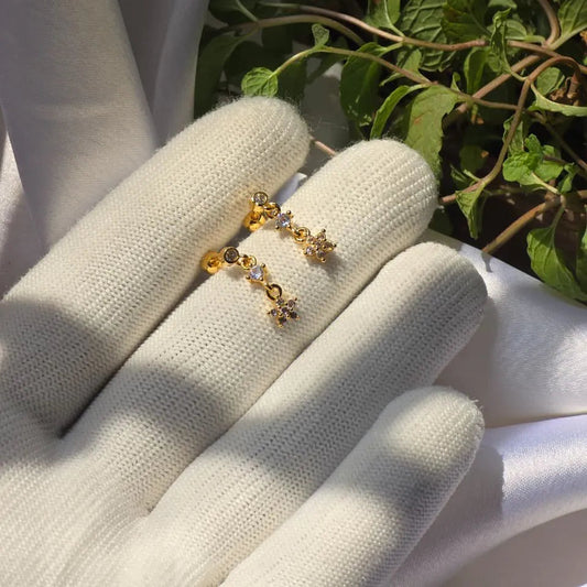 Twinkle Drop Gold Ear Piercing
